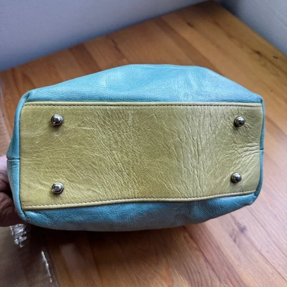 Susan Farber Collections turquoise bag with signature leather vintage